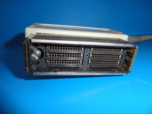 a close up of a device on a blue surface