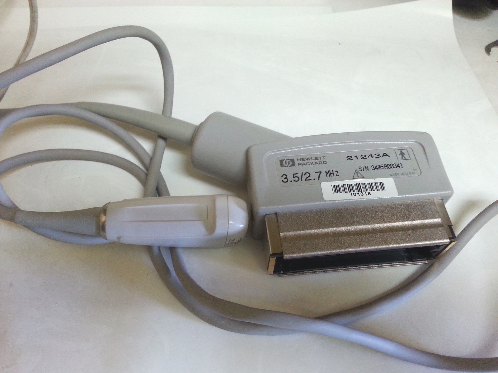 a close up of a probe and a cord on a table