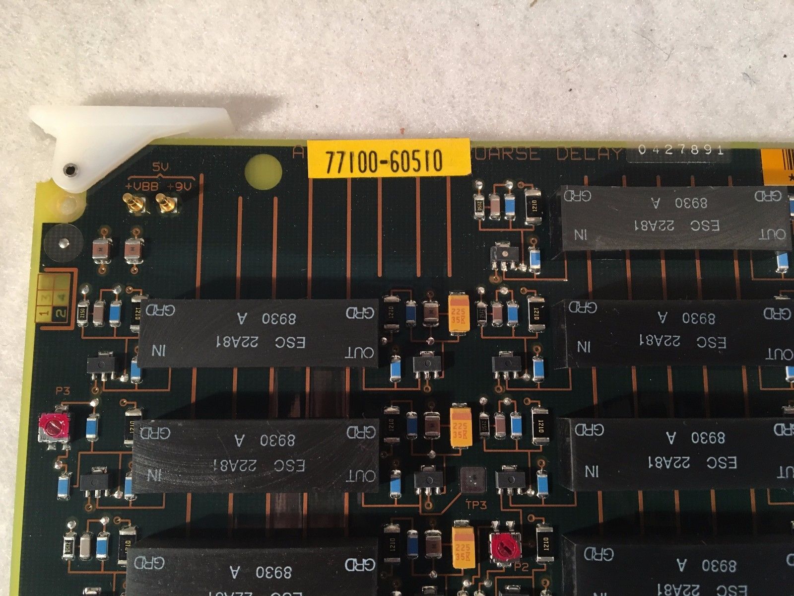 a close up of a circuit board with many different types of electronic components