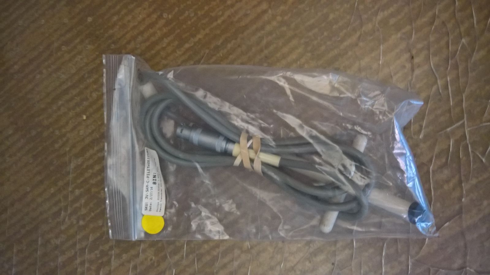 a couple of wires sitting on top of a plastic bag