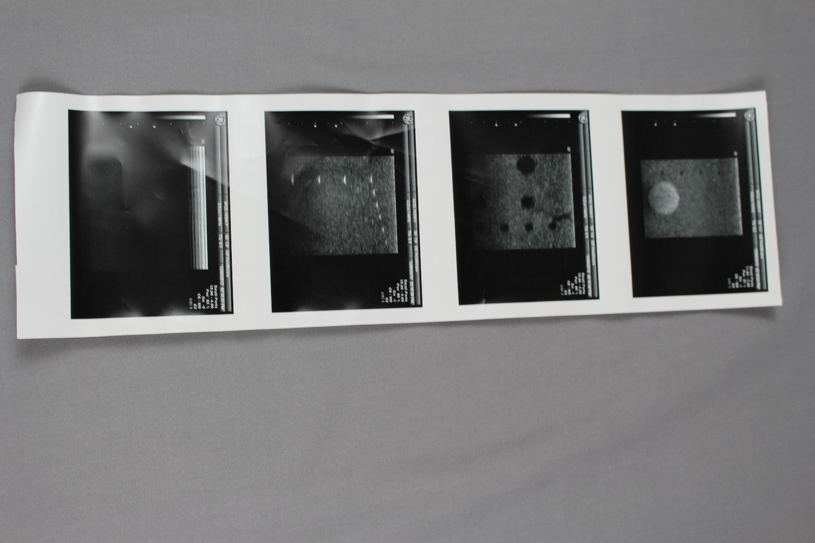 photographs of the same object on a wall