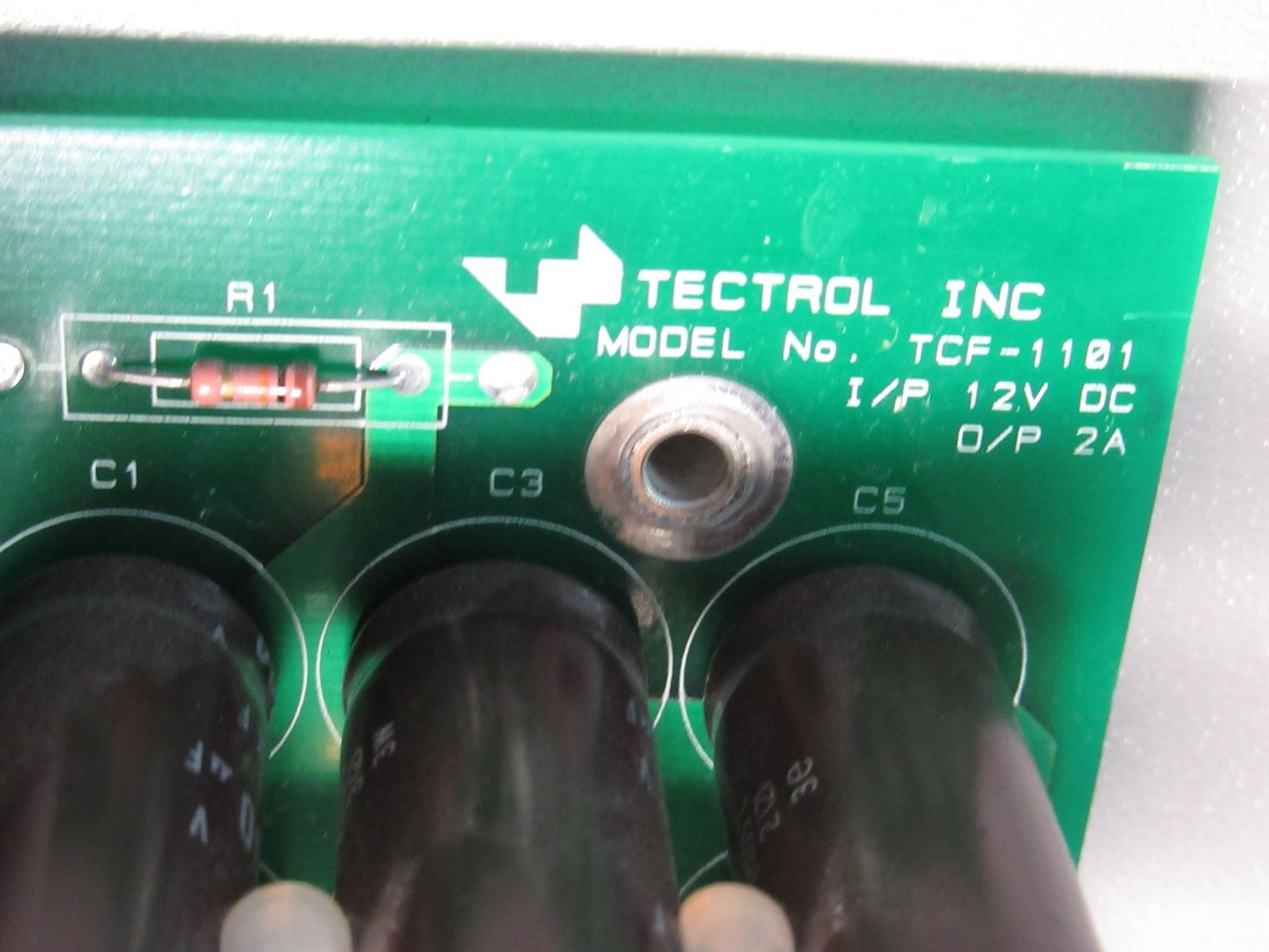 a close up of a green electronic device