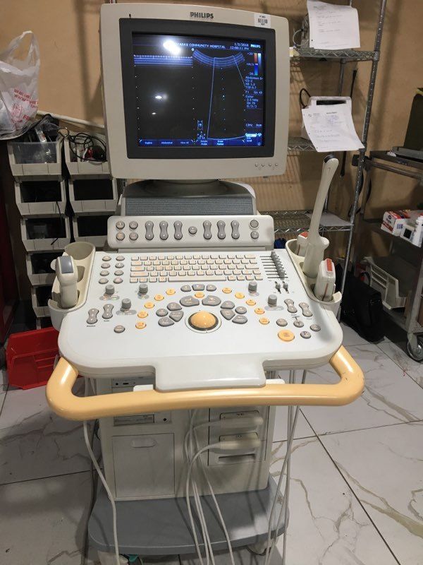 a computer monitor sitting on top of a table