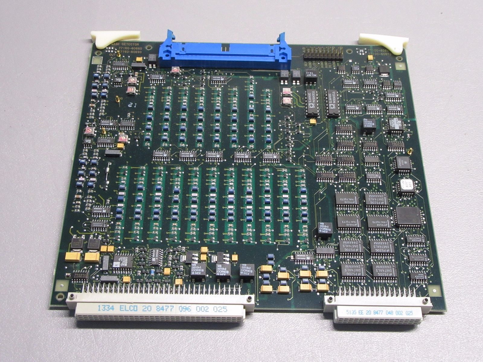 a close up of a computer board with many electronic components
