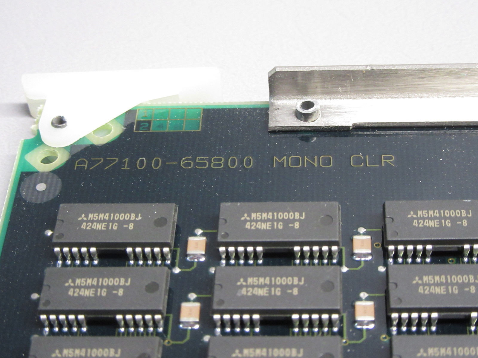 a close up of a circuit board with many small pieces of electronic equipment