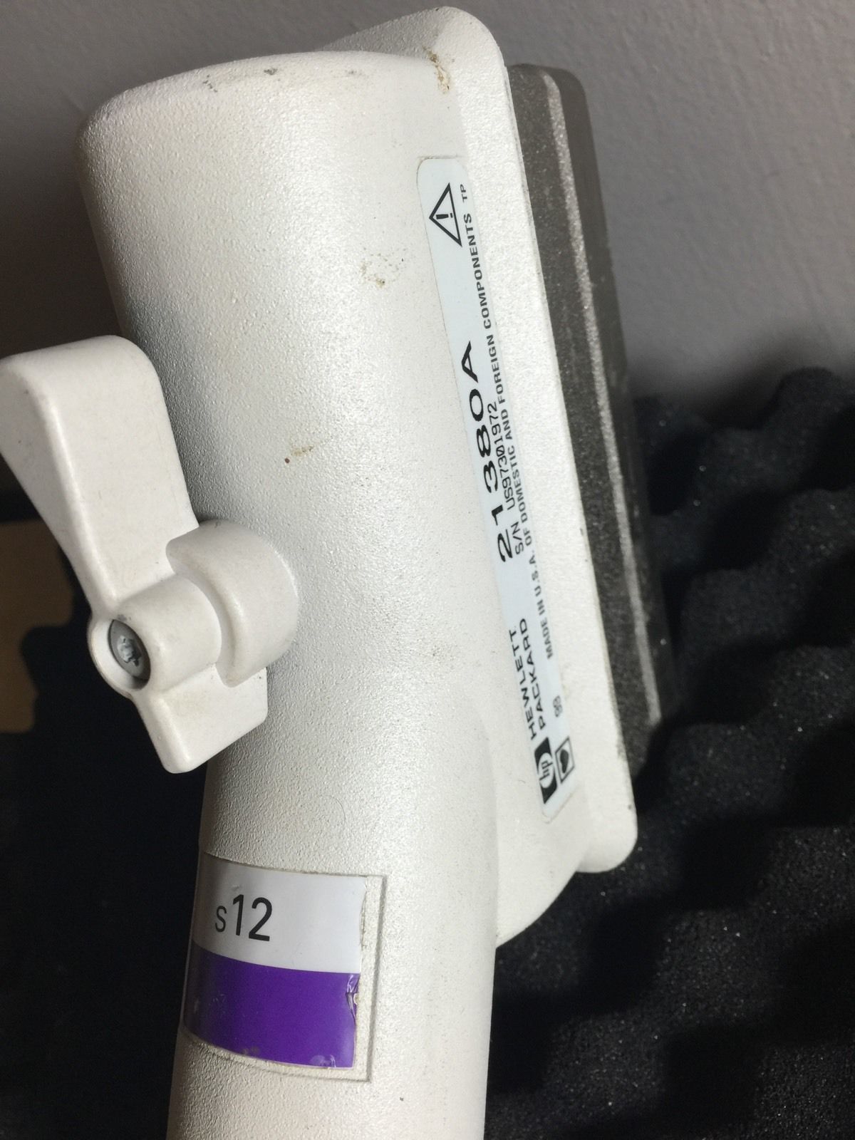 a close up of a white object on a shelf