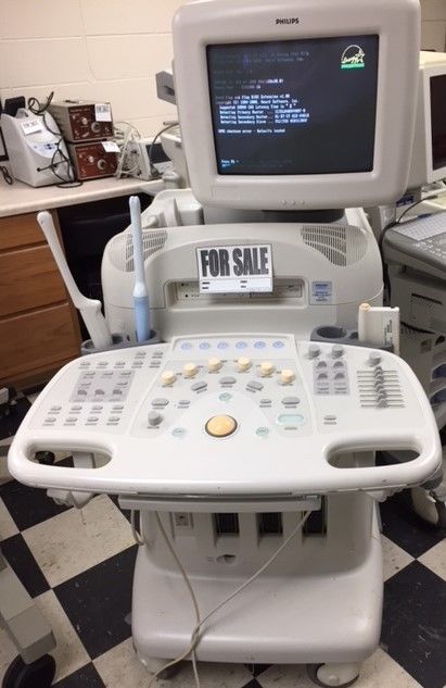 a hospital room with a monitor and medical equipment