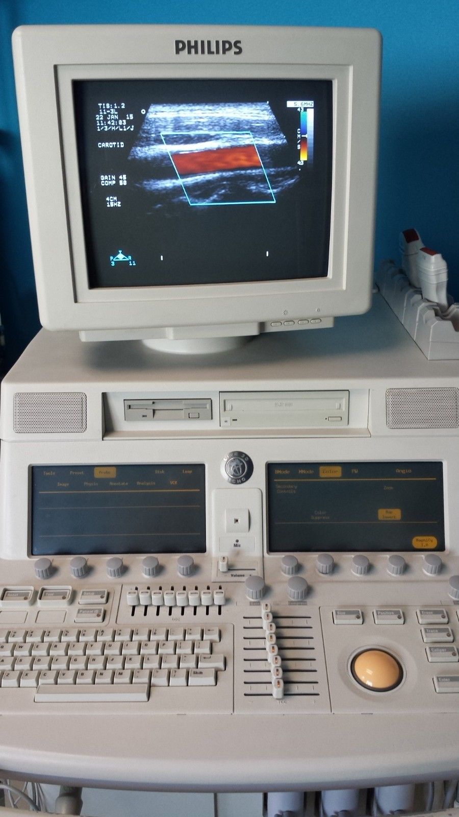 a computer monitor sitting on top of a desk