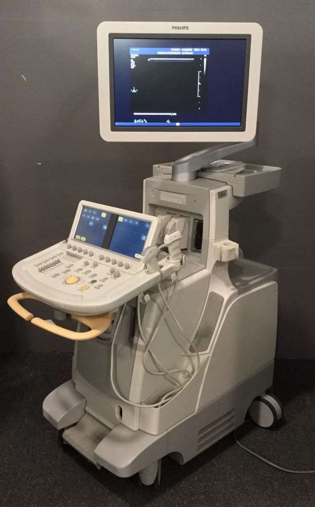 a medical machine with a monitor on top of it