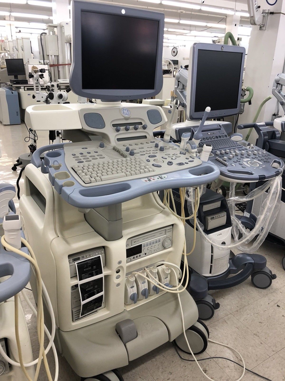 a hospital room filled with medical equipment and monitors