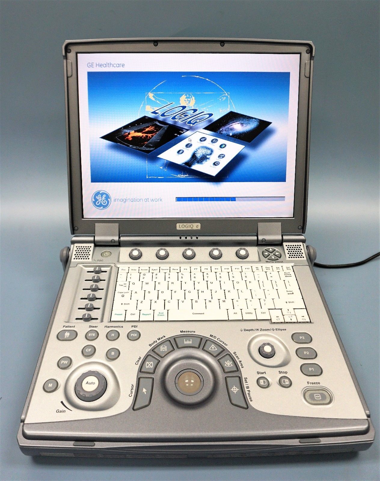 an open laptop computer sitting on top of a table