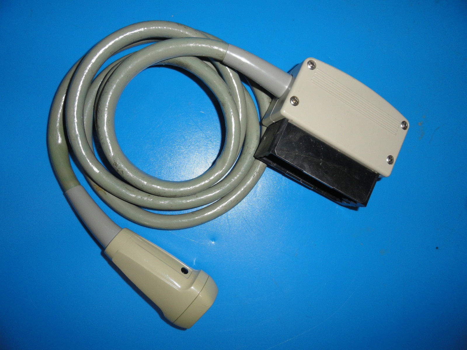 a close up of a cable connected to a device