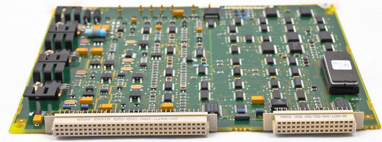 a close up of a computer board with many electronic components