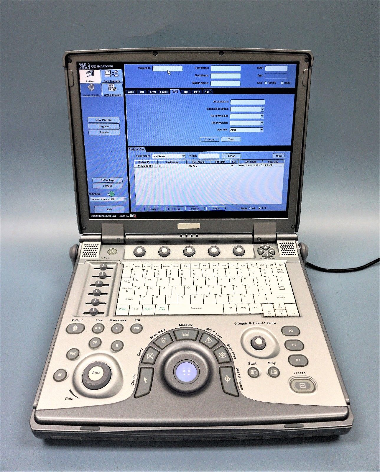a ultrasound computer sitting on top of a table