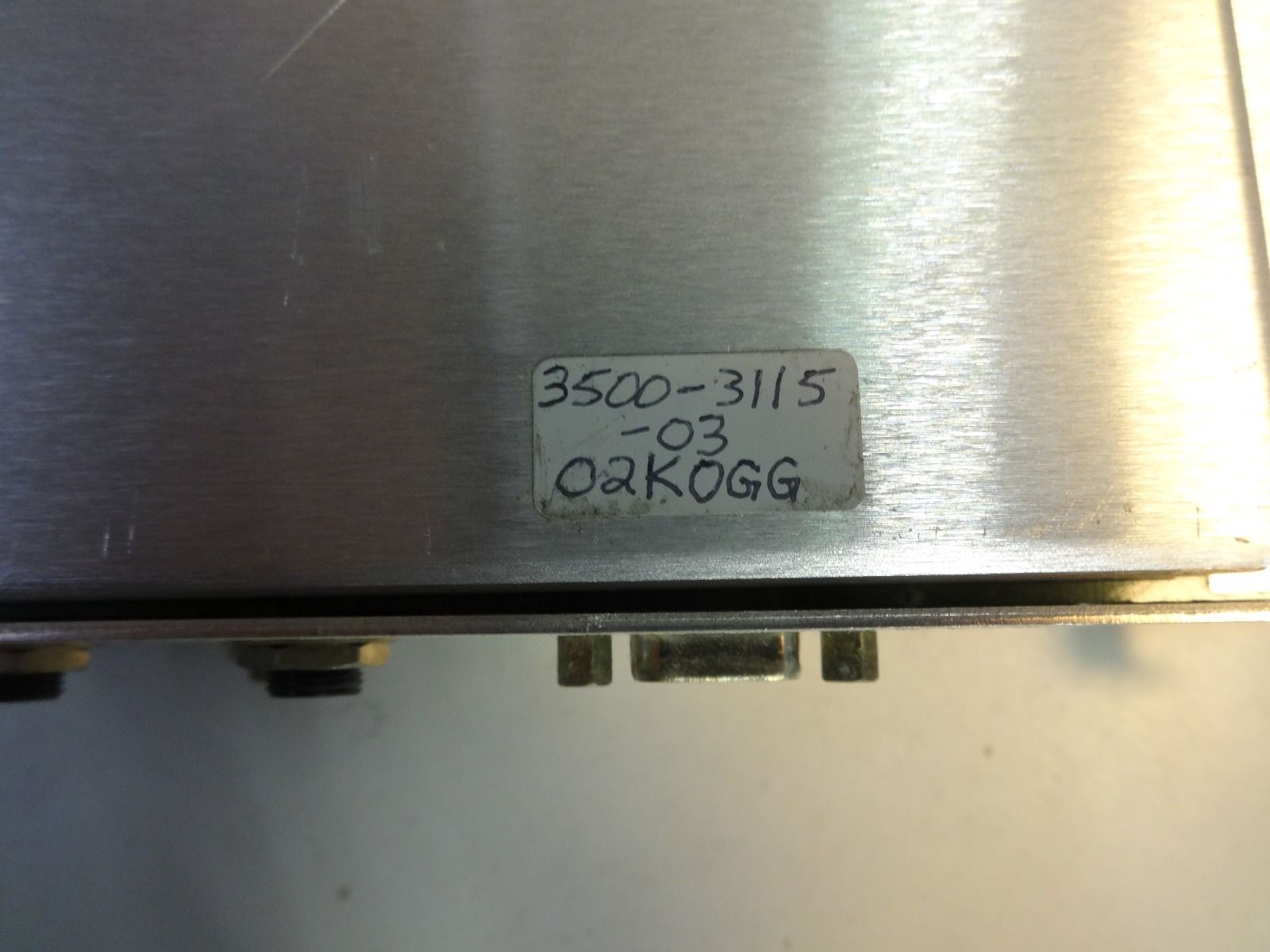 a close up of a metal object with a label on it