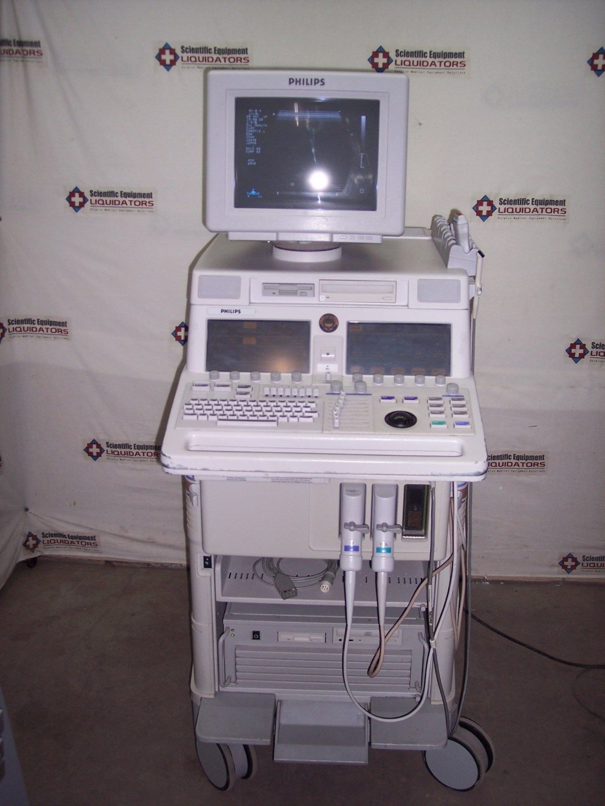 a medical machine with a monitor on top of it