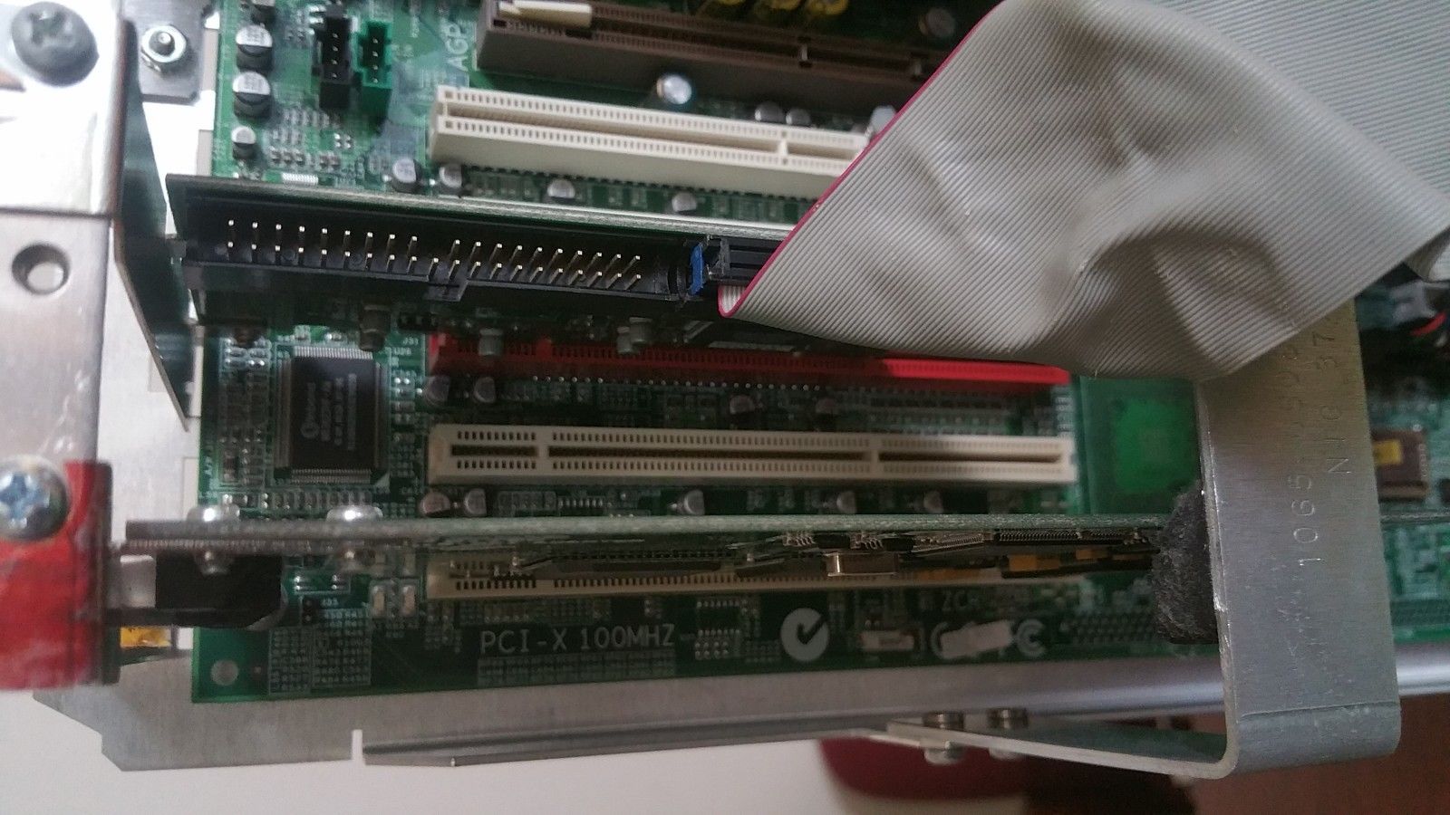 a close up of a computer motherboard with a cloth on top of it