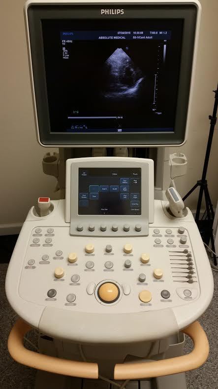 a medical machine with a monitor on top of it