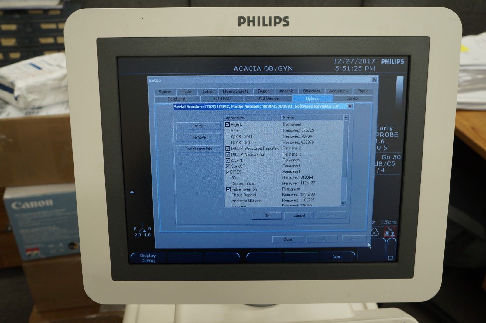 a computer monitor sitting on top of a desk